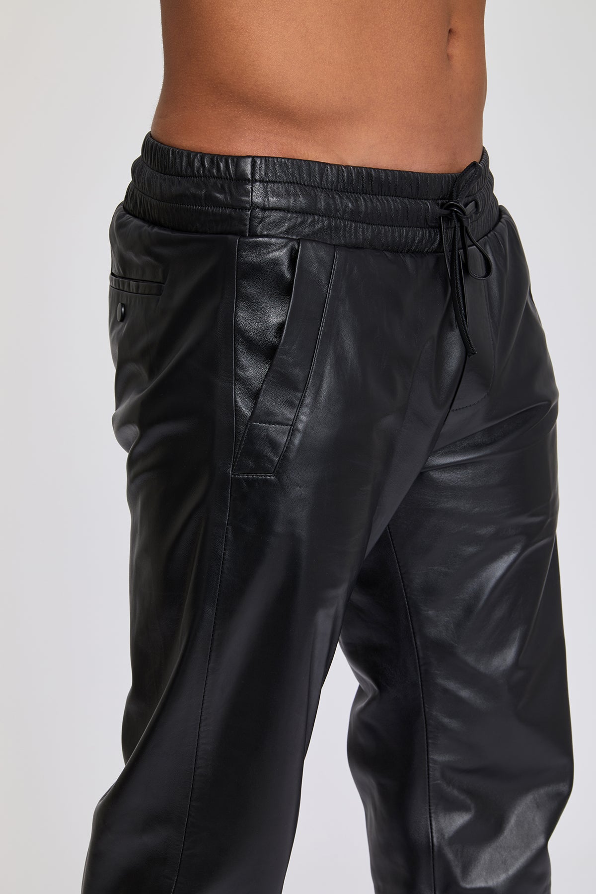 Men's leather pants. 100 % real Turkish leather. Lambskin. Soft. Great quality. Regular fit. Elastic waistband. Side pockets. Luxurious.